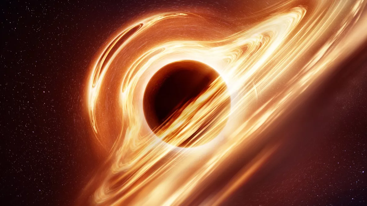 艺术家绘制的黑洞插图。 黑洞的中心是奇点的例子。 （图片来源：来自 Getty Images 的 solarseven）